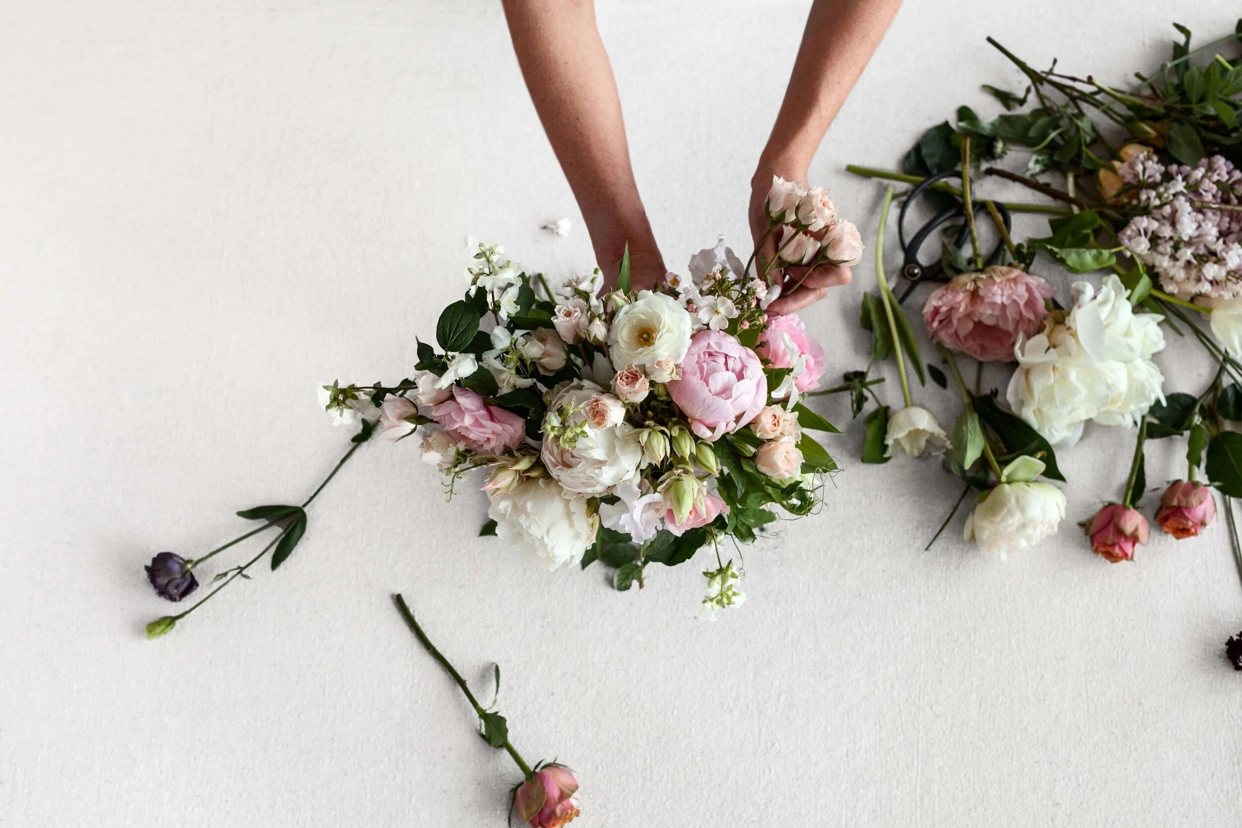 Florist arranging flowers
